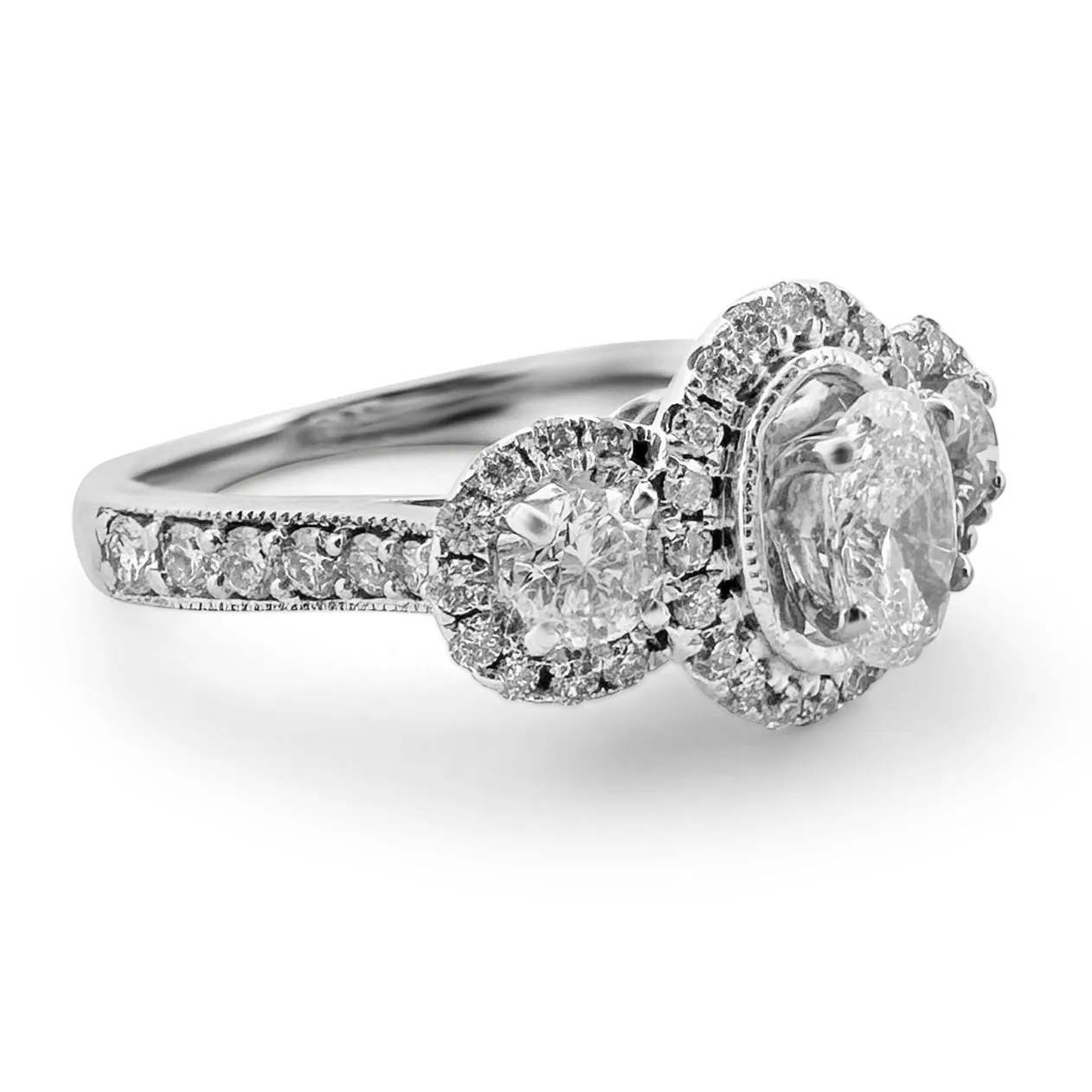 1.16ctw 3-stone Oval and Round Halo Engagement Ring in 14k White Gold