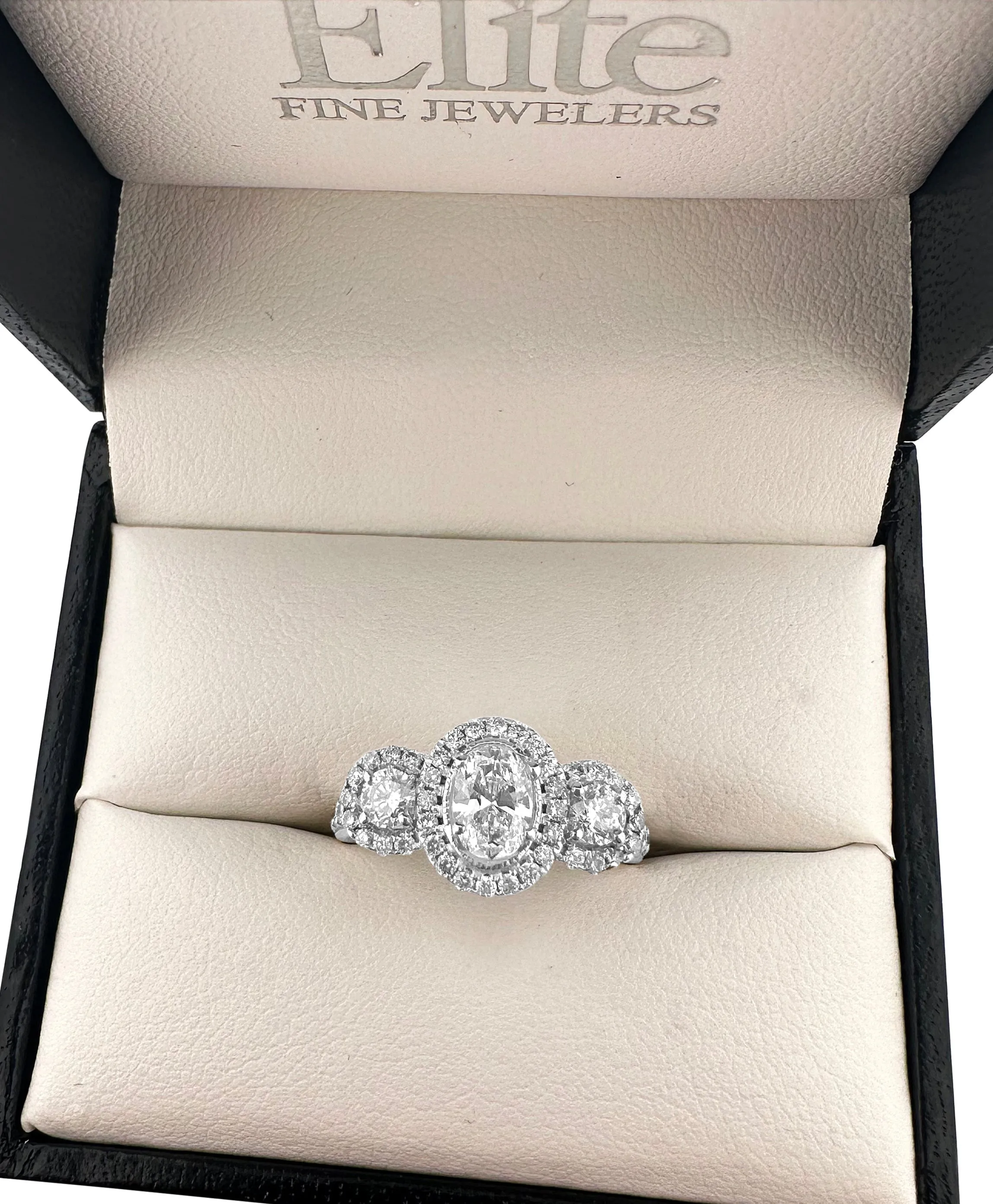 1.16ctw 3-stone Oval and Round Halo Engagement Ring in 14k White Gold