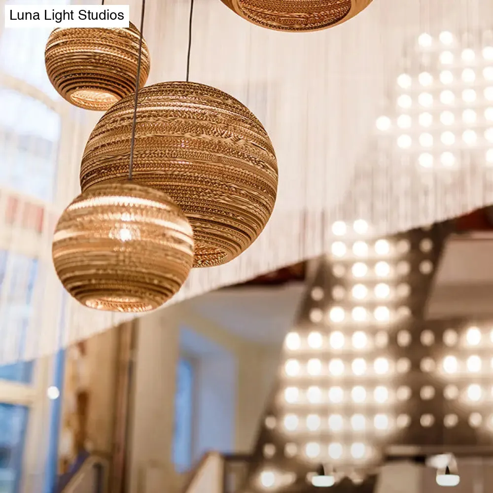 Asian Stylish Brown Corrugated Paper Pendant Lamp with Drum Shape and Globe Design - 1 Light Indoor Suspension Light