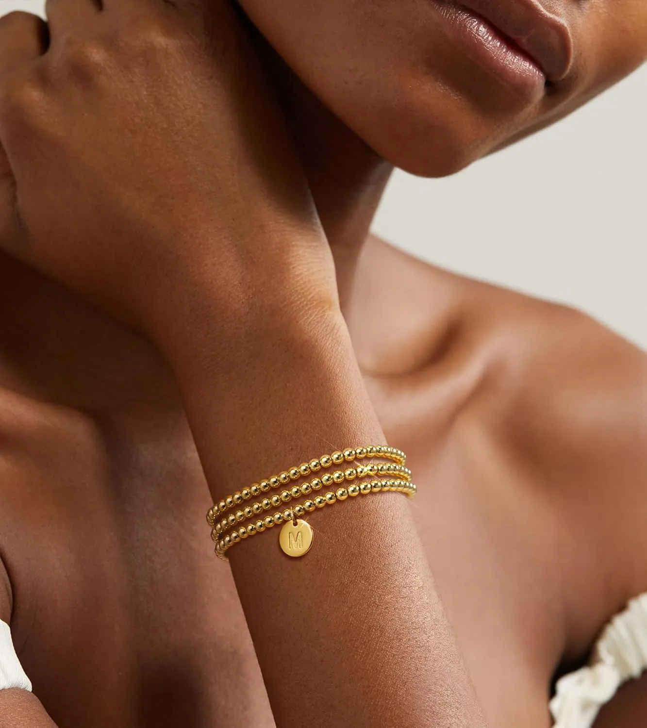 doubgood Gold Bracelets for Women, 18K Gold Plated Beaded Bracelet with A-Z Coin Alphabet Pendant Stretch Jewelry Gifts for Mother's Day Christmas