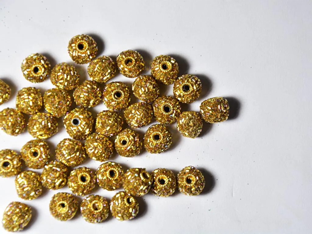 Golden Spherical Beaded Clay Beads