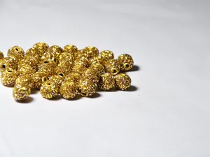 Golden Spherical Beaded Clay Beads