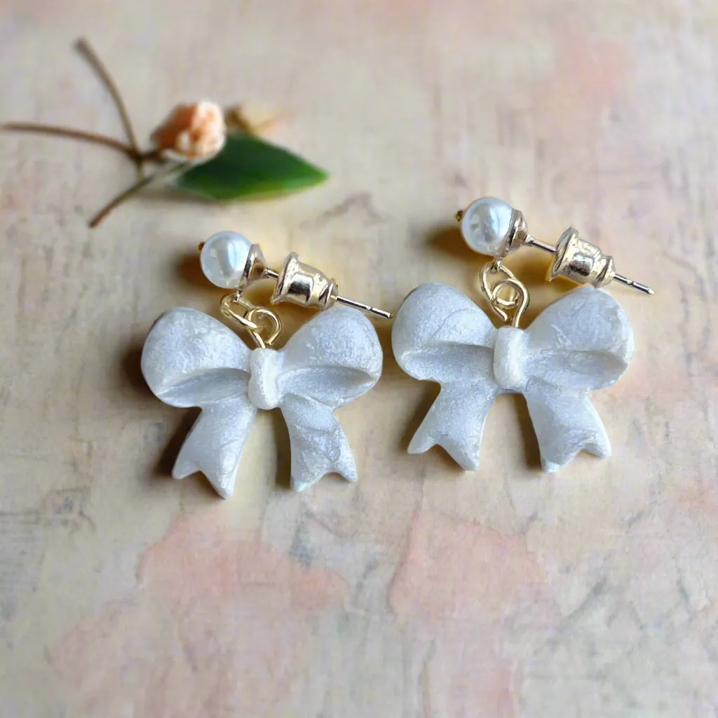 Handmade White Bow Earrings with Gold Accents and Pearl Studs – Elegant Polymer Clay Jewelry"