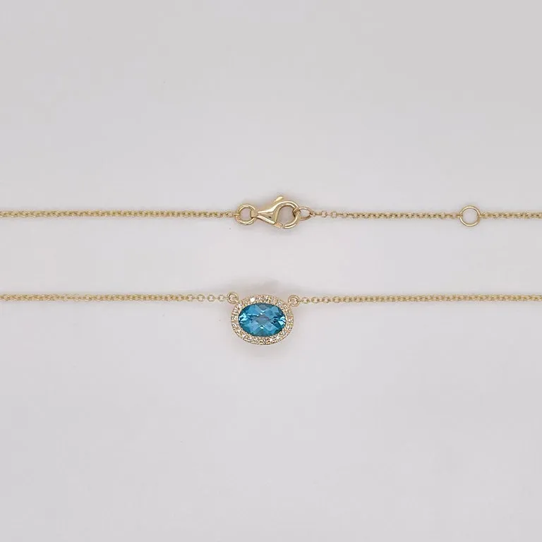 Horizontal Oval Blue Topaz and Diamond Halo Necklace