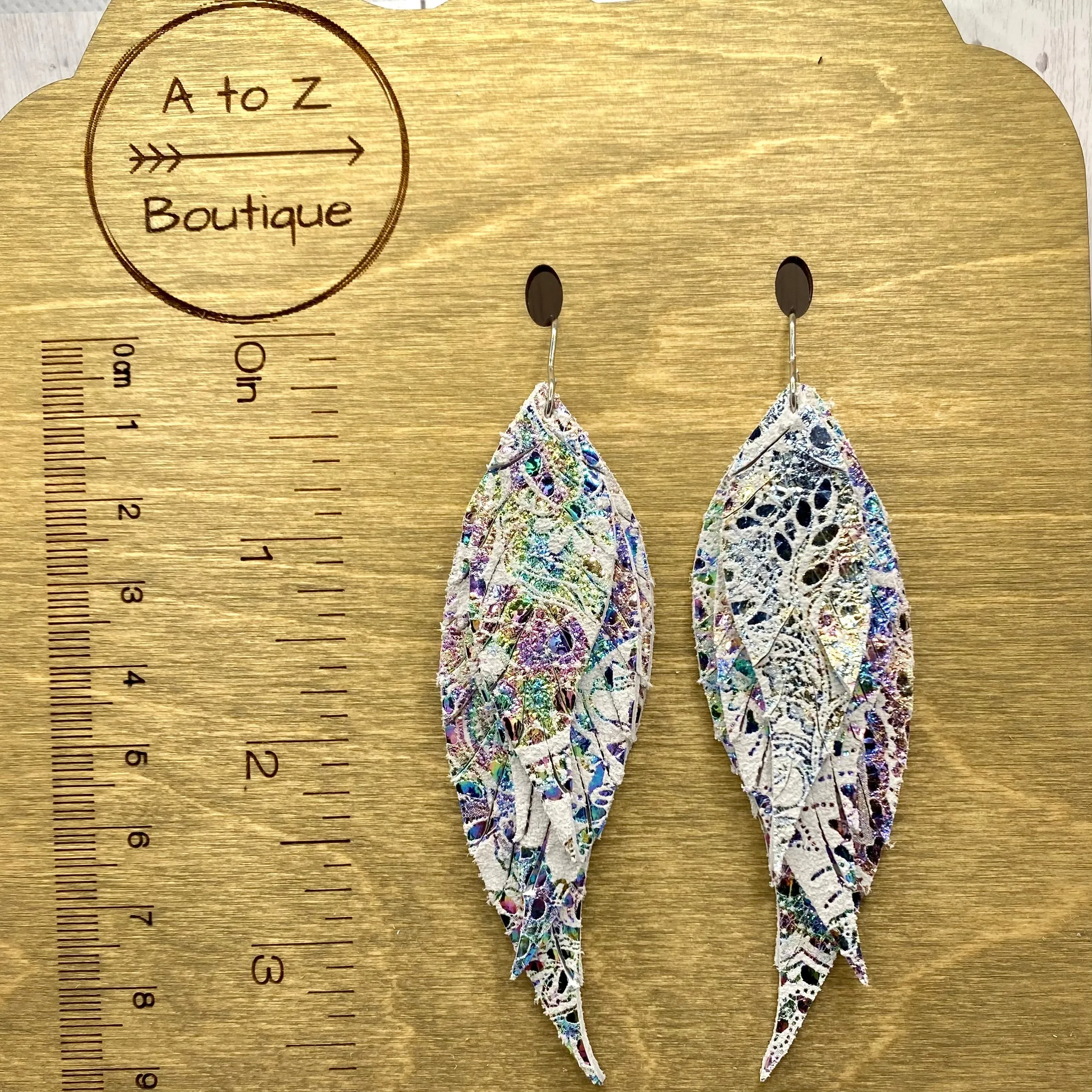 White Iridescent Paisley Genuine Leather Feather Earrings